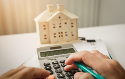 Man calculating his home budget